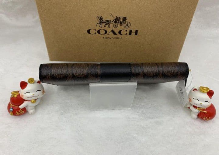 新品未使用コーチ長財布ブラウンブラックシグネチャーレディースメンズ送料無料