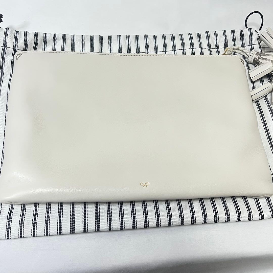 ANYA HINDMARCH ステッカーデザイン クラッチバッグ　フリンジ