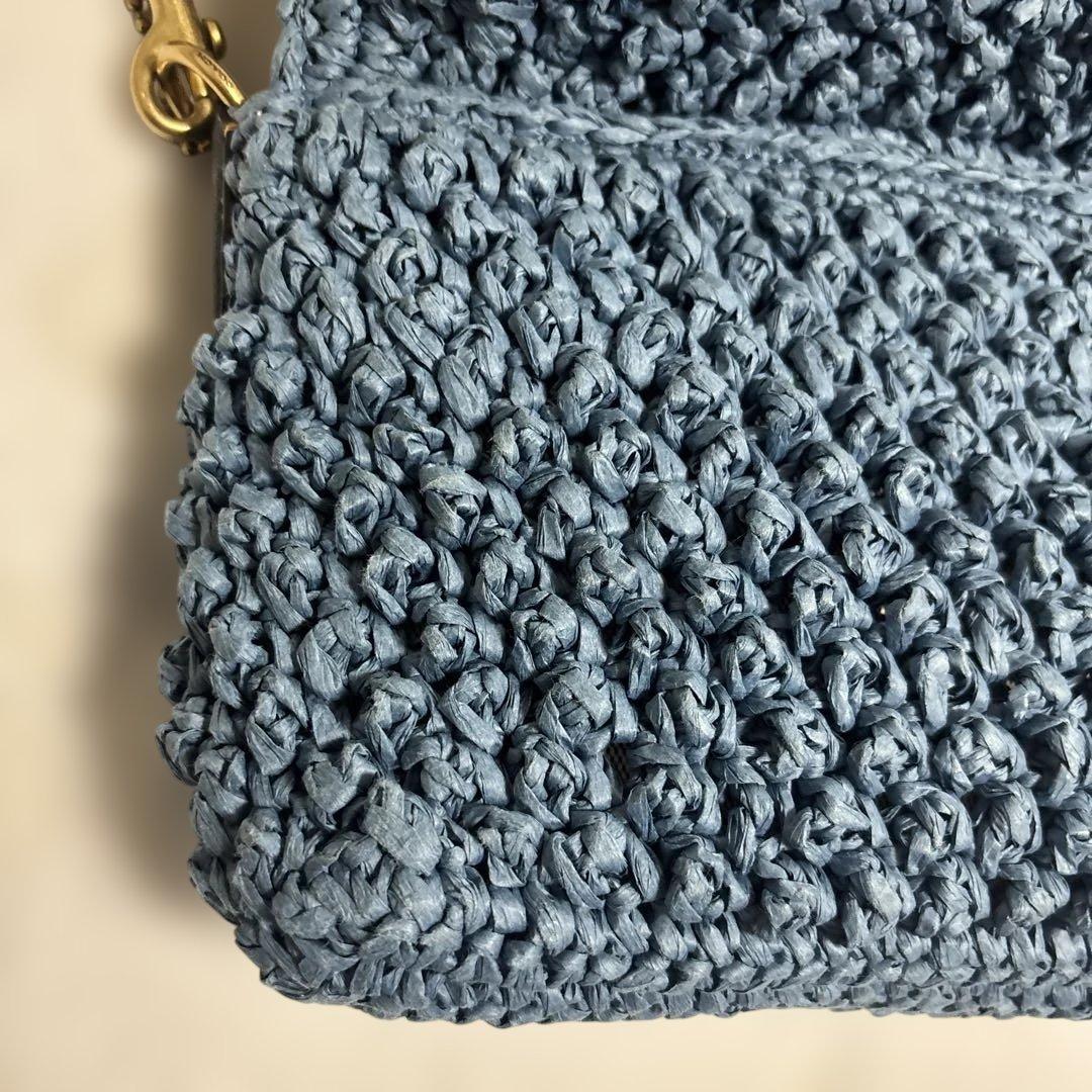 COACH チェリー柄ストロー素材ハンドバッグ