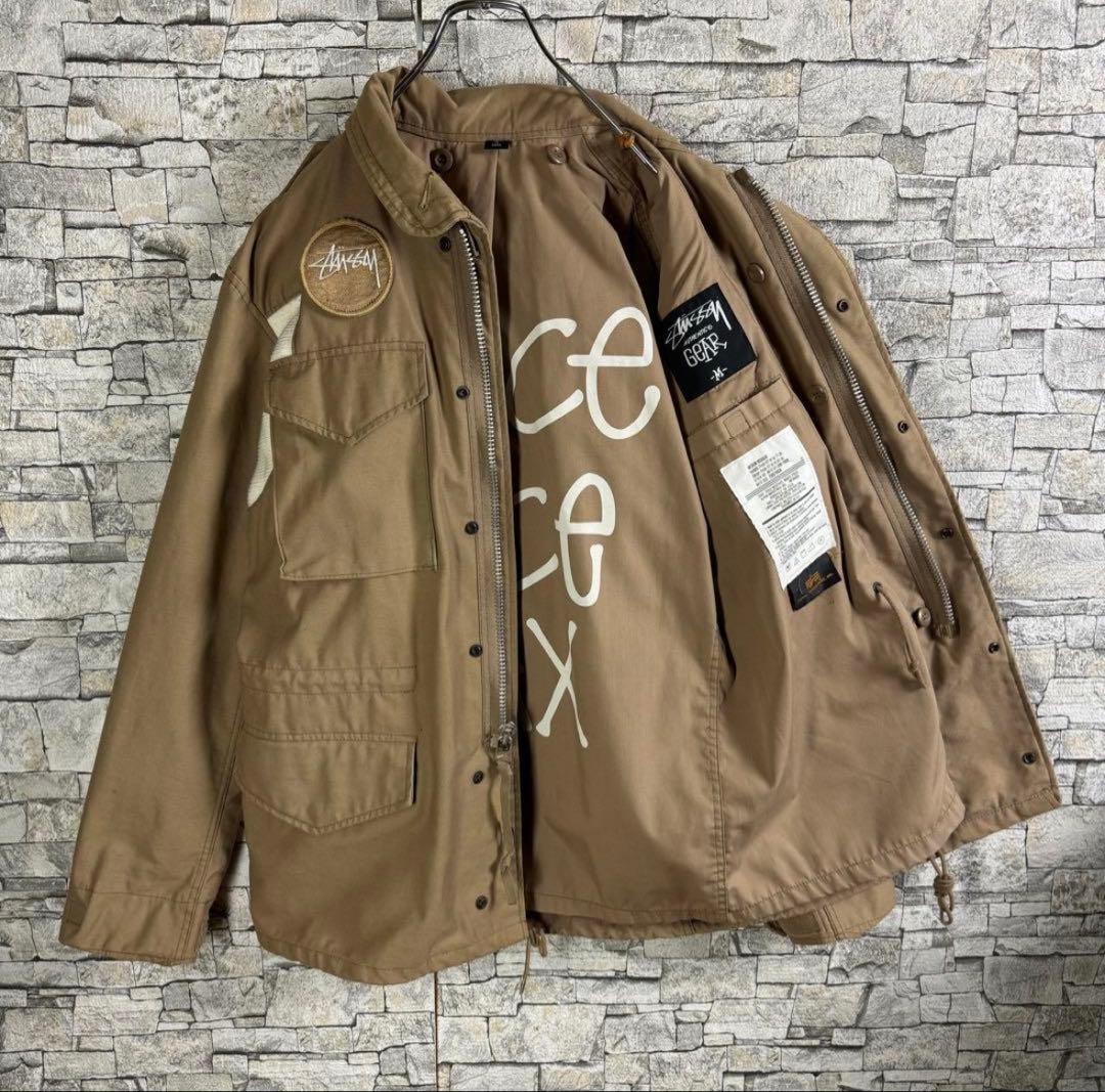 【超希少25周年記念M-65,】STUSSY ALPHA コラボ ジャケット