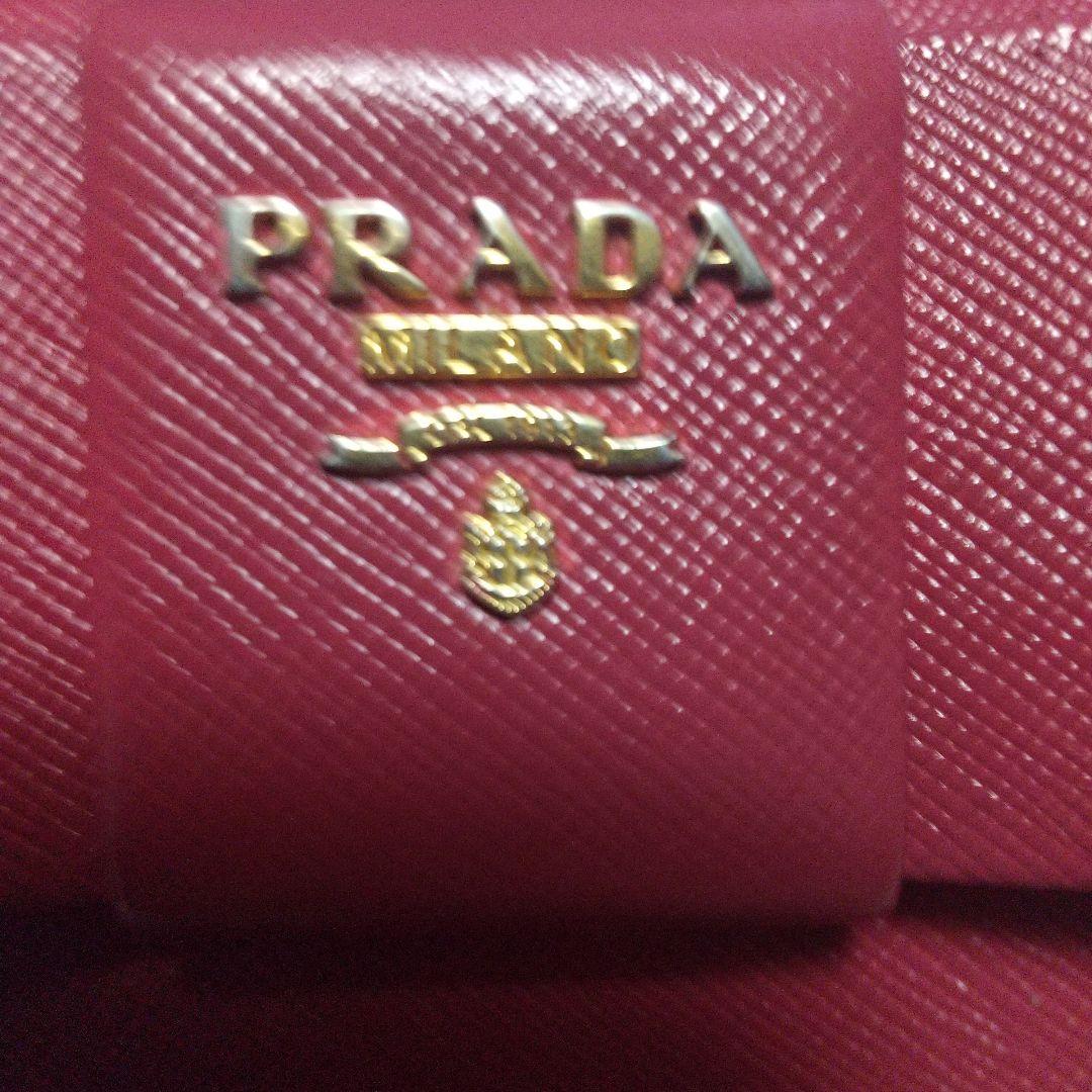 PRADA サフィアーノラウンドファスナー 長財布 リボン付き