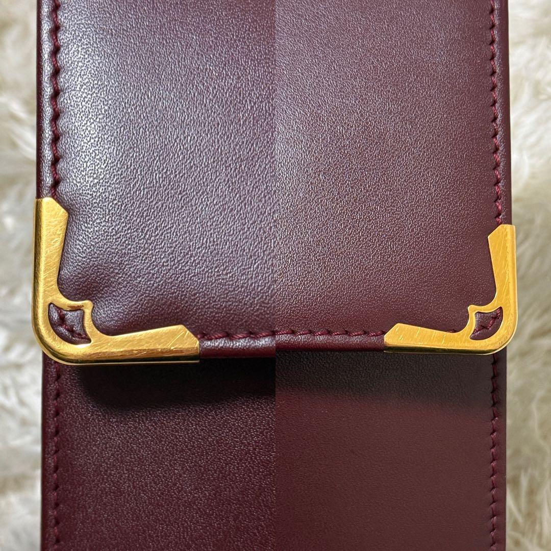 カルティエ　マストライン　クラッチバッグ　ボルドー　ロゴ金具