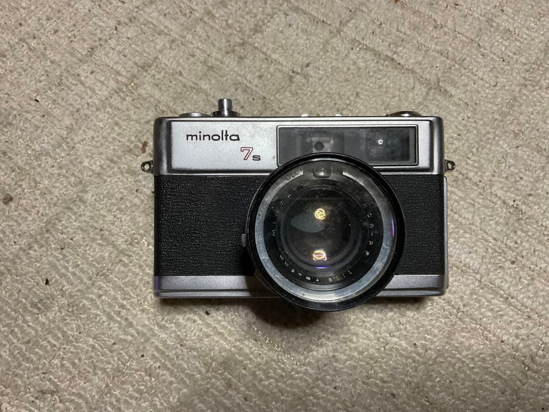 ミノルタ・7S。フイルムカメラ。【中古品　現状　カメラカバーなし　昭和レトロ】。