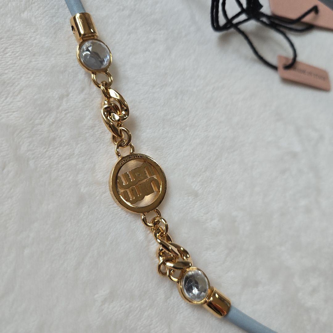 miu miu スマホストラップ 水色