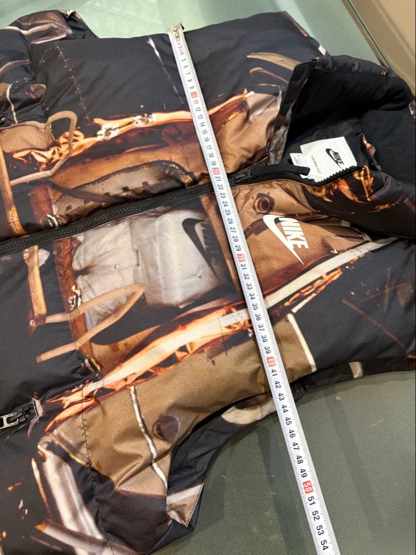 最終価格NIKE グラフィックプリント ダウンベスト Lサイズ