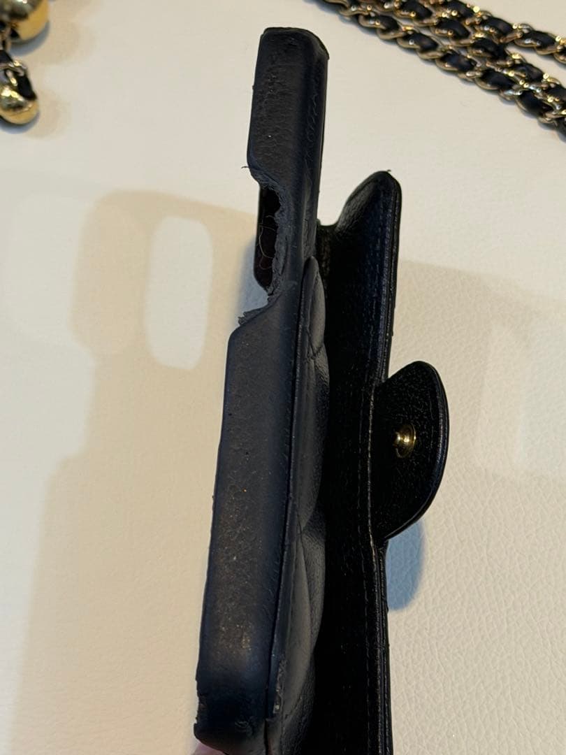 CHANEL iPhone14Proスマホケースキャビアスキンマトラッセチェーン