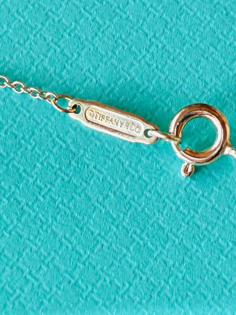 名古屋ウィメンズマラソン2019 GO WOMEN グレイ系のネックレス、