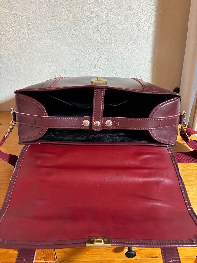 就実高校　通学バッグ　エンジ