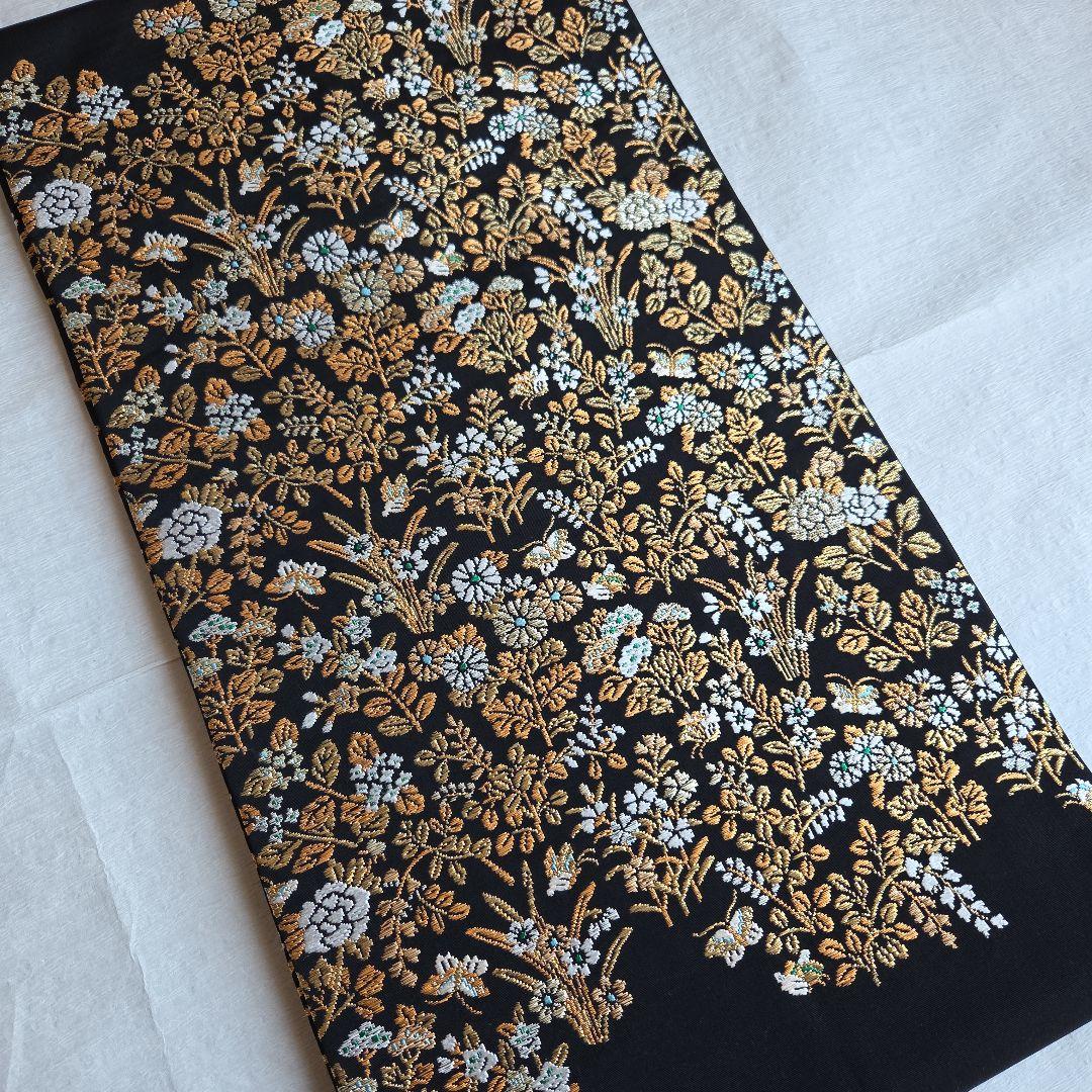 帯屋捨松　細かな煌めきを締める　草花模様の名古屋帯