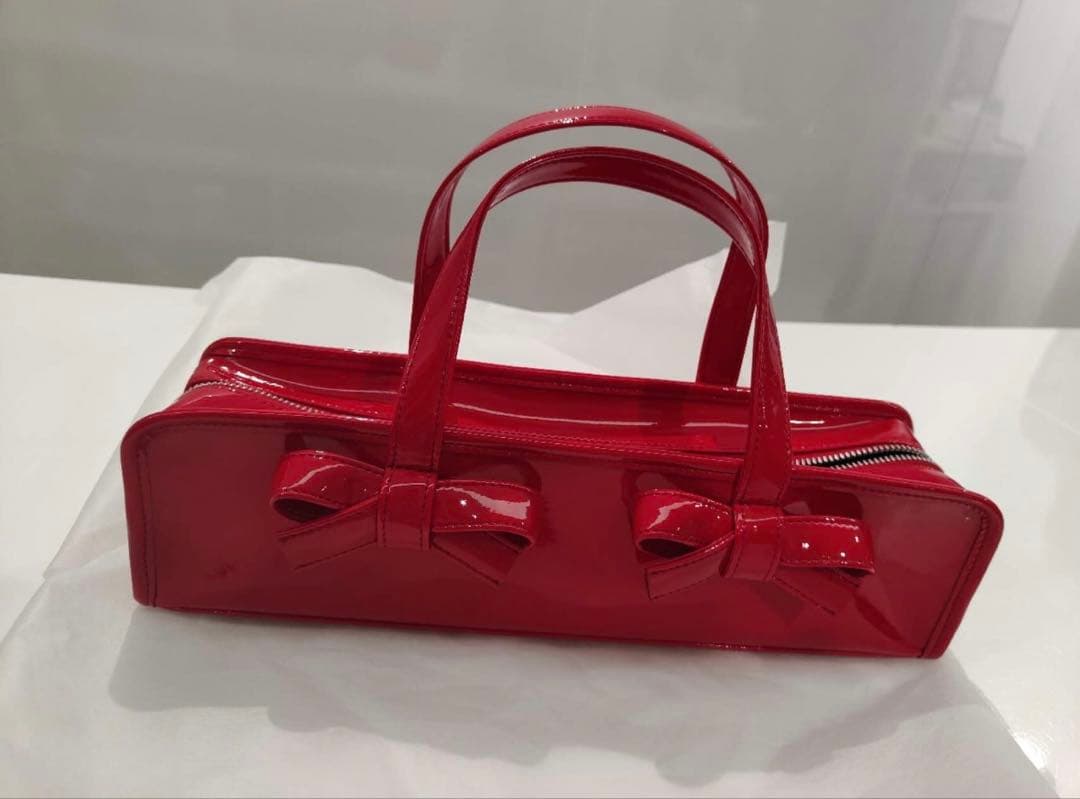 COMME des GARÇONS リボン付きレッドバッグ