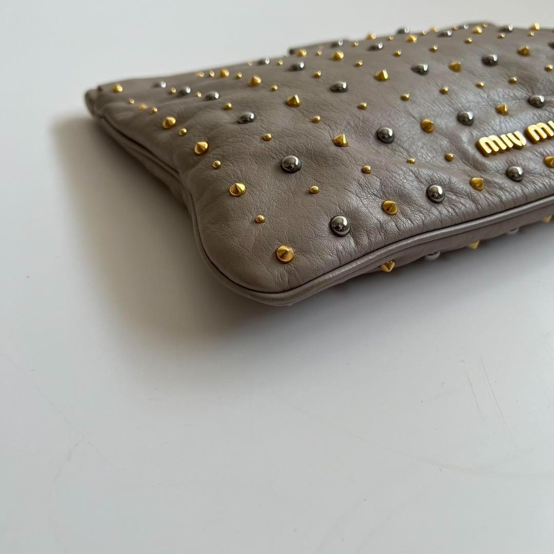 バッグ MIU MIU LEATHER STUDS FRAME CLUTCH BAG