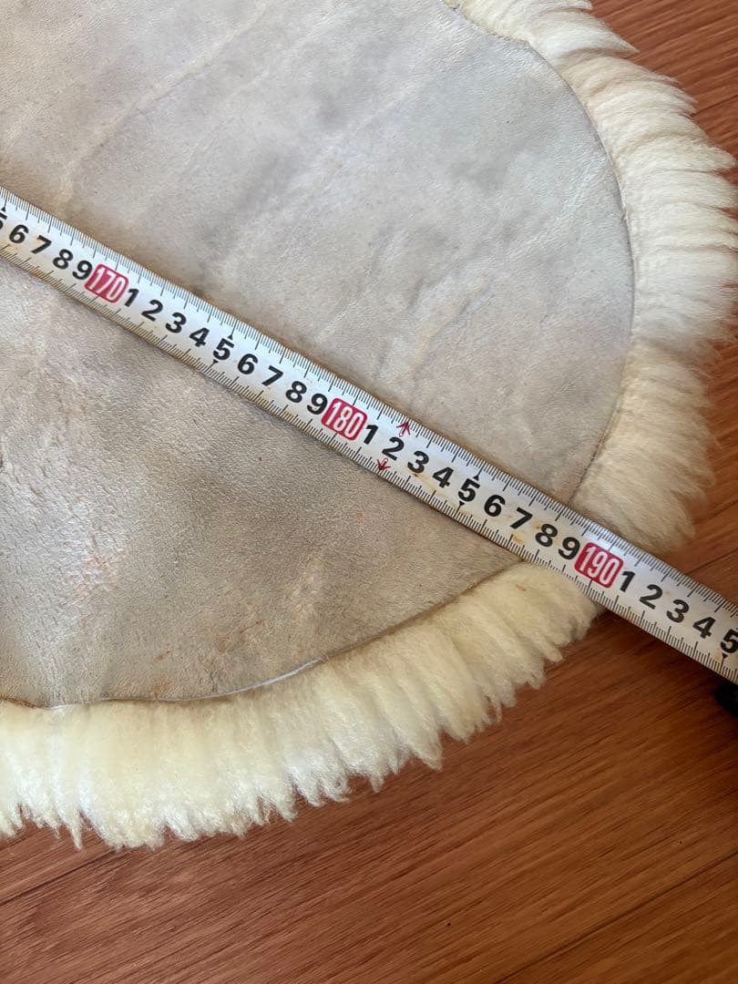 クリーム色 羊毛ラグ 約190cm x 80cm