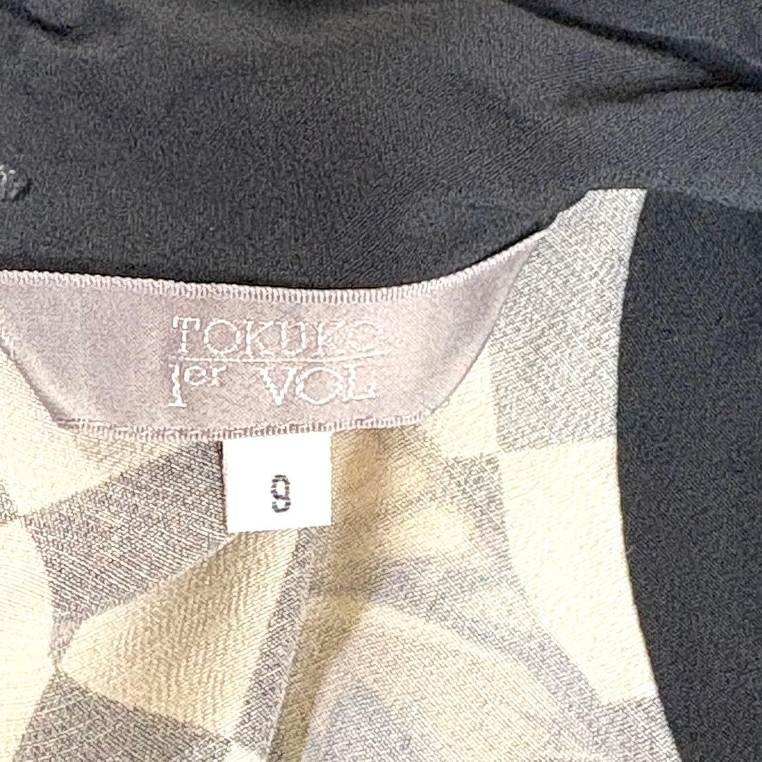 トクコプルミエヴォル✨デザインチュニック　ブラウス　総柄　音楽家　変形　9号