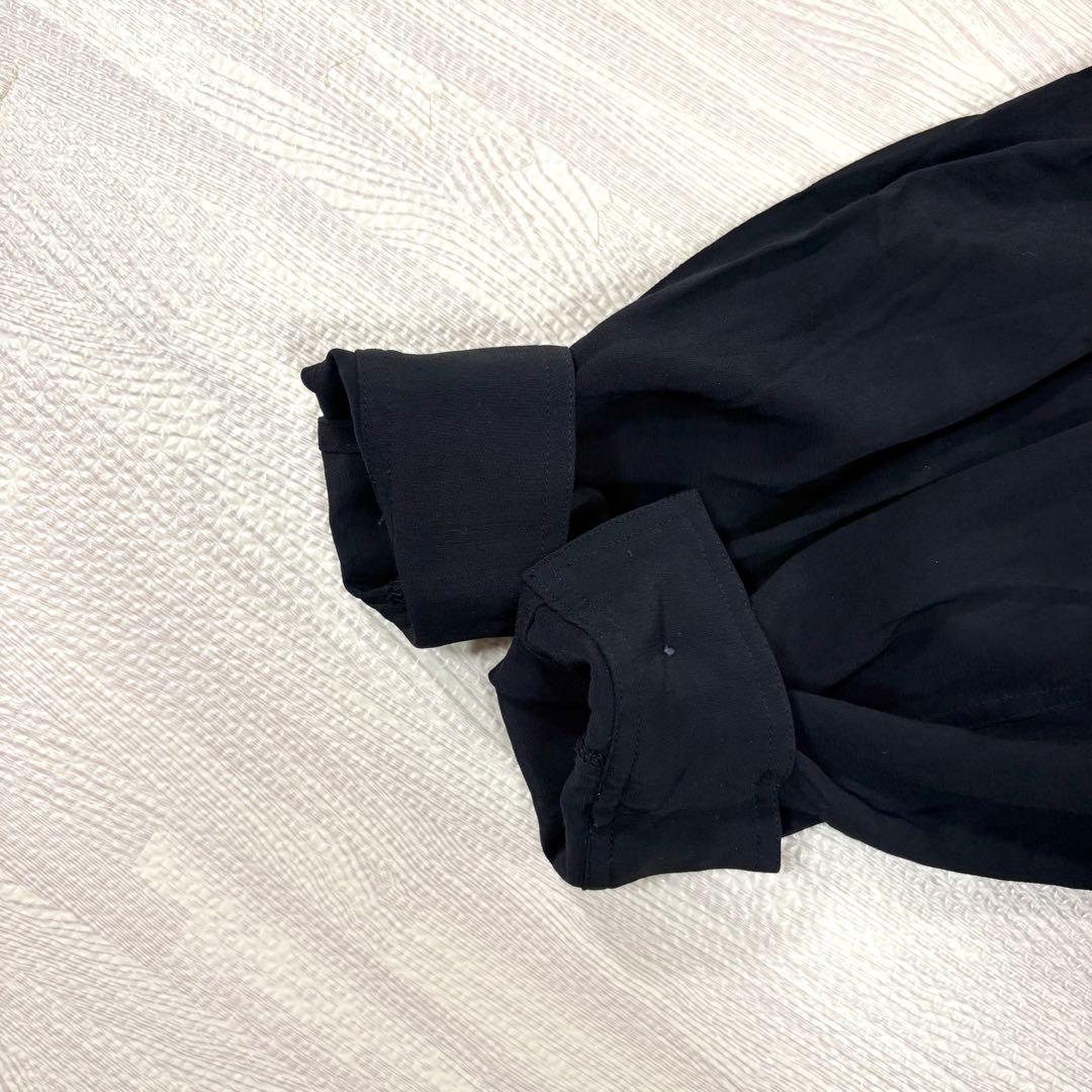 トクコプルミエヴォル✨デザインチュニック　ブラウス　総柄　音楽家　変形　9号