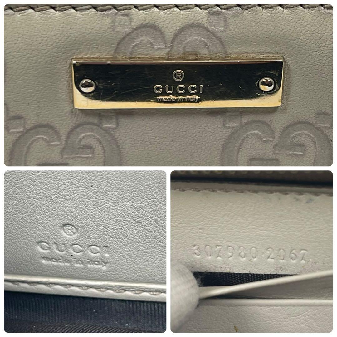 グッチ　長財布　GGシマレザー　ロゴプレート　ロゴ総柄　型押　ラウンドファスナー