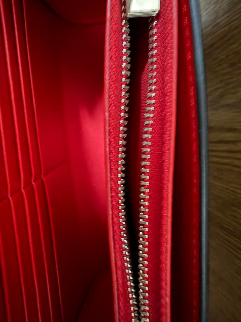 Christian Louboutin スタッズ付きシルバークラッチバッグ