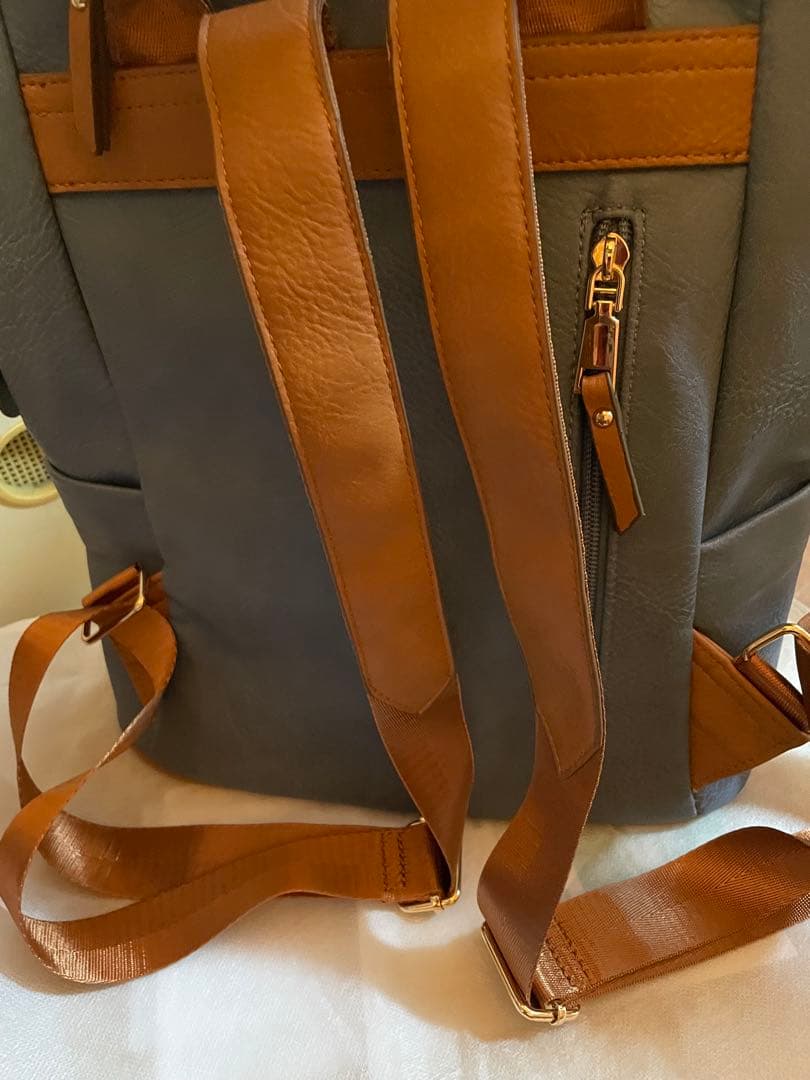 ブルーグレーのリュックで run run run/ミナペルホネン