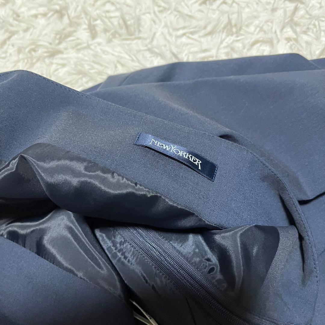 ネイビー ビジネススーツ ニューヨーカー　ノーカラースーツ