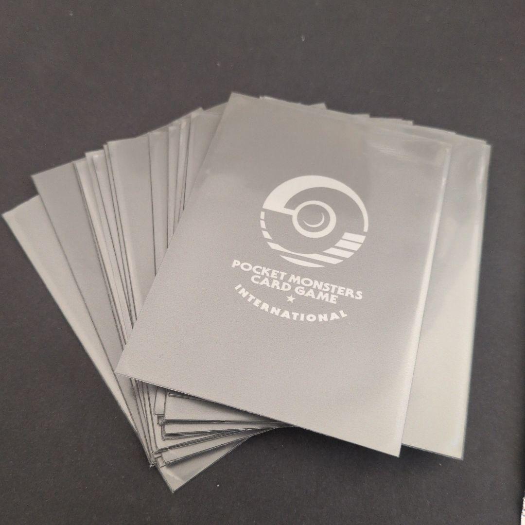 ポケモンカードセット（ピカチュウ含む）開封済みパック2点+オマケ（スリーブ）