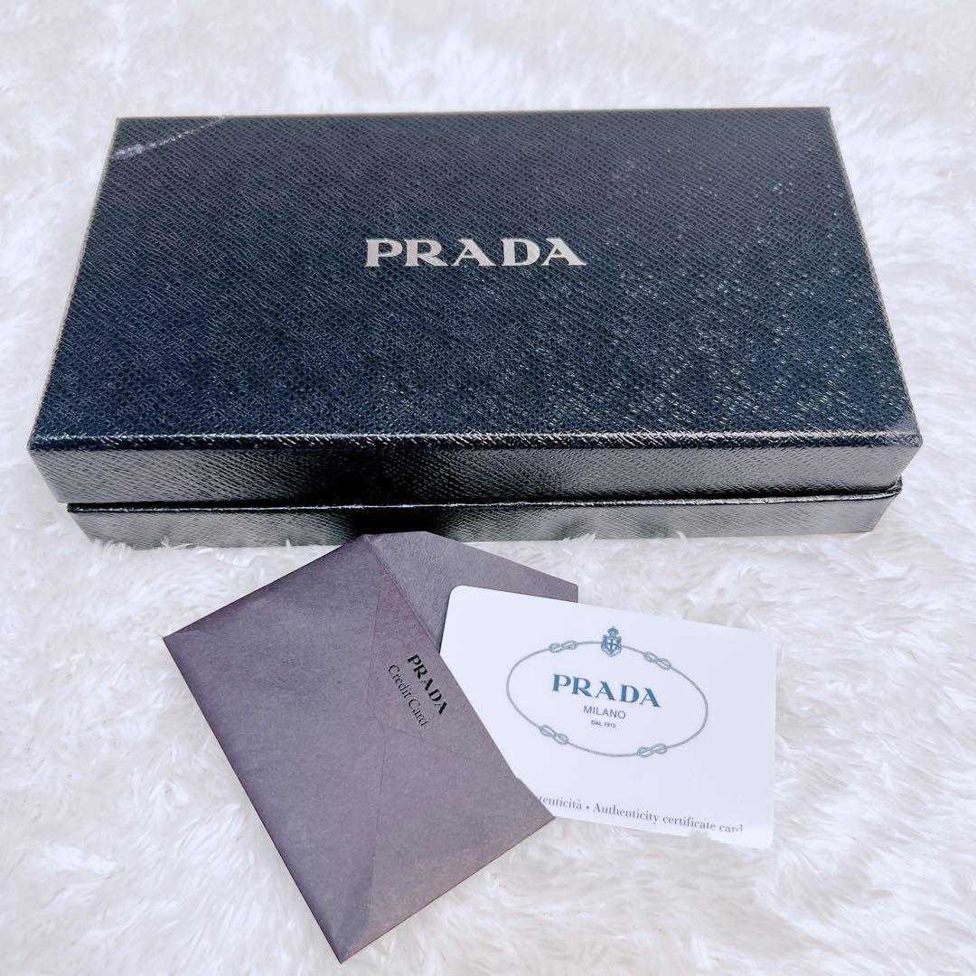 PRADA プラダ　長財布　サフィアーノ　フィオッコ　メタルロゴ　ピンク　リボン