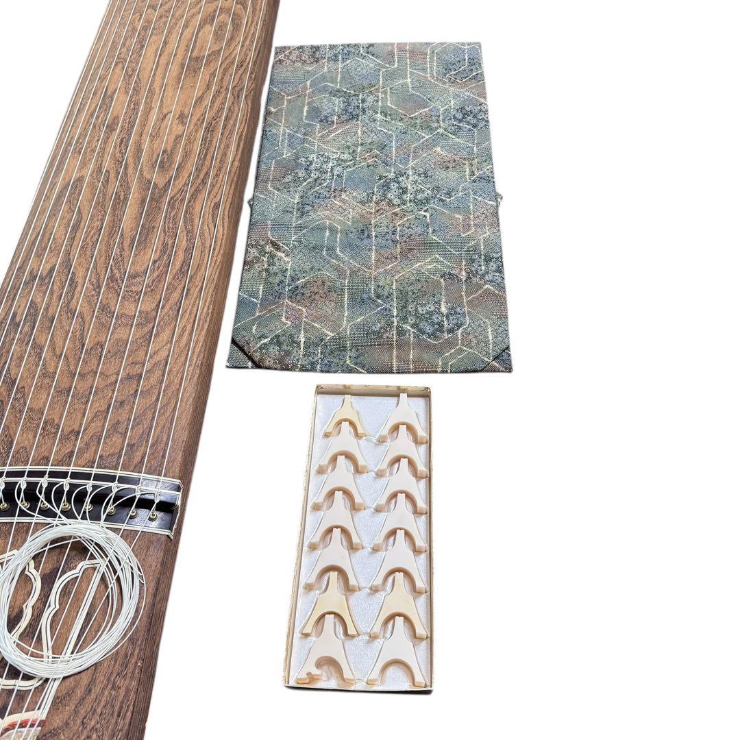 【最上級品】くり甲 綾杉彫 13絃箏 琴 透かし玉縁包み