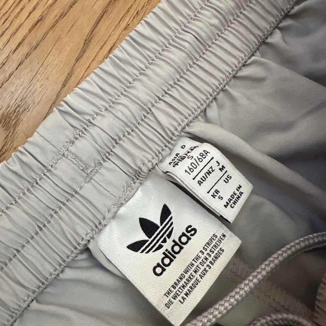 adidasAdileniumオーバーサイズジップオフトラックパンツMアディダス