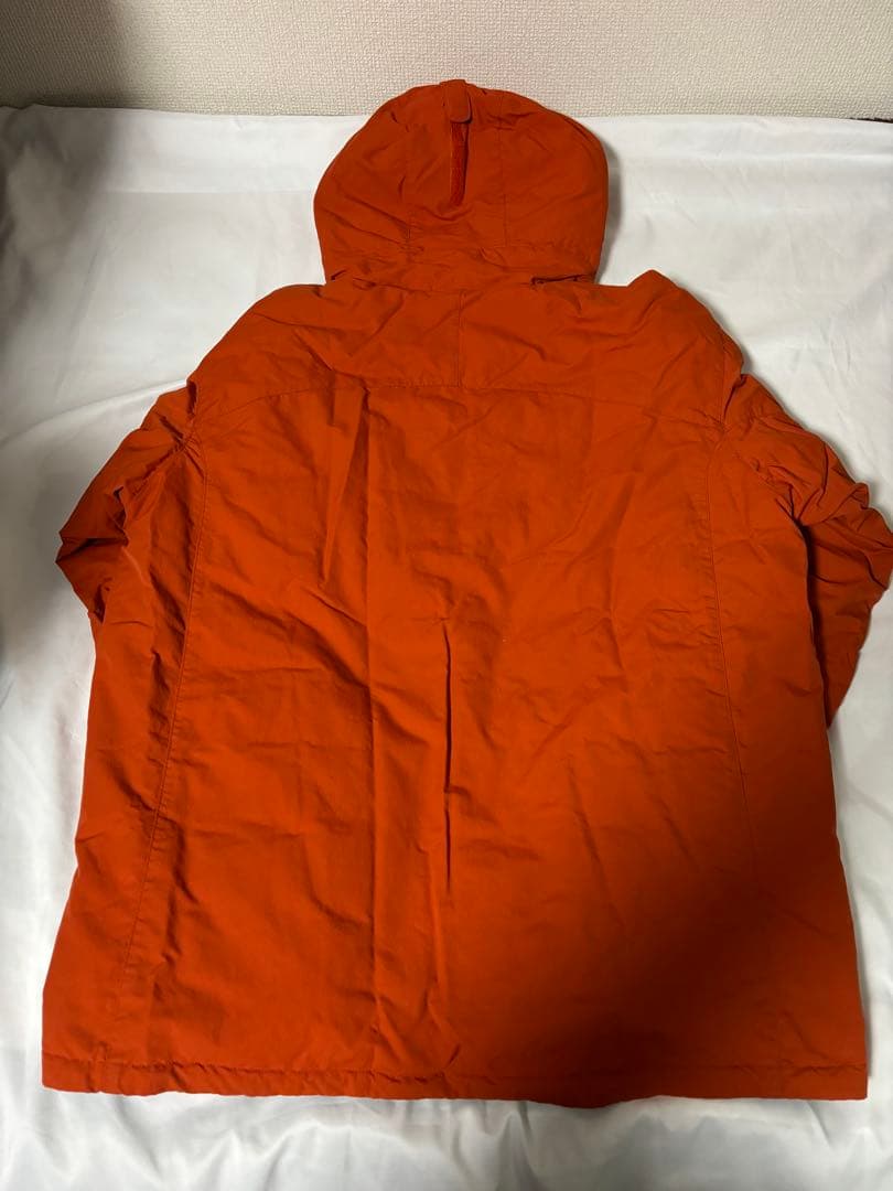 人気モンベル725FP コロラドパーカ　メンズLリバーシブルダウンオレンジグレー
