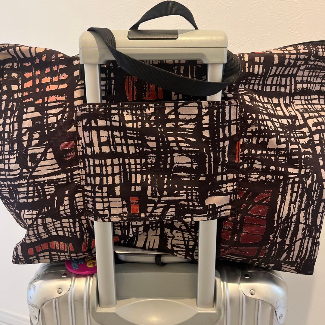 used・TUMI折畳みボストンバッグ・背にループ付き