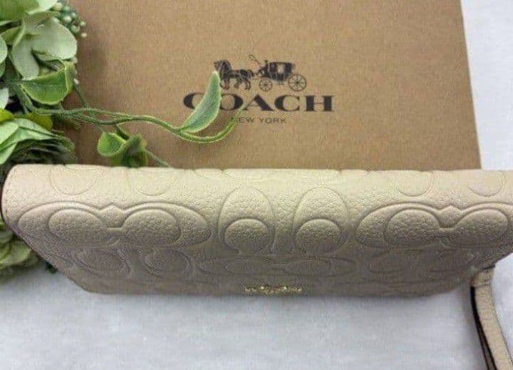 新品未使用コーチ長財布ロゴシグネチャーホワイトレディースメンズ送料無料即日発送