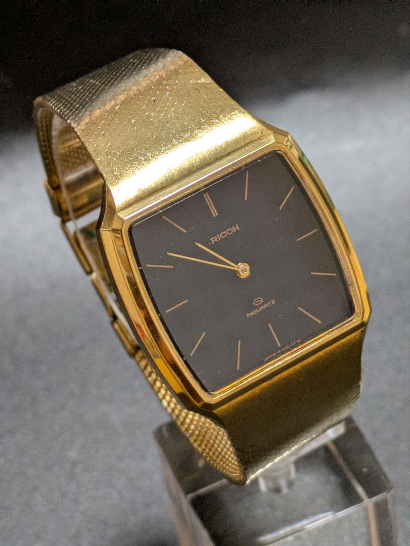 RICOH ブラック＆ ゴールド アンティーククォーツ腕時計