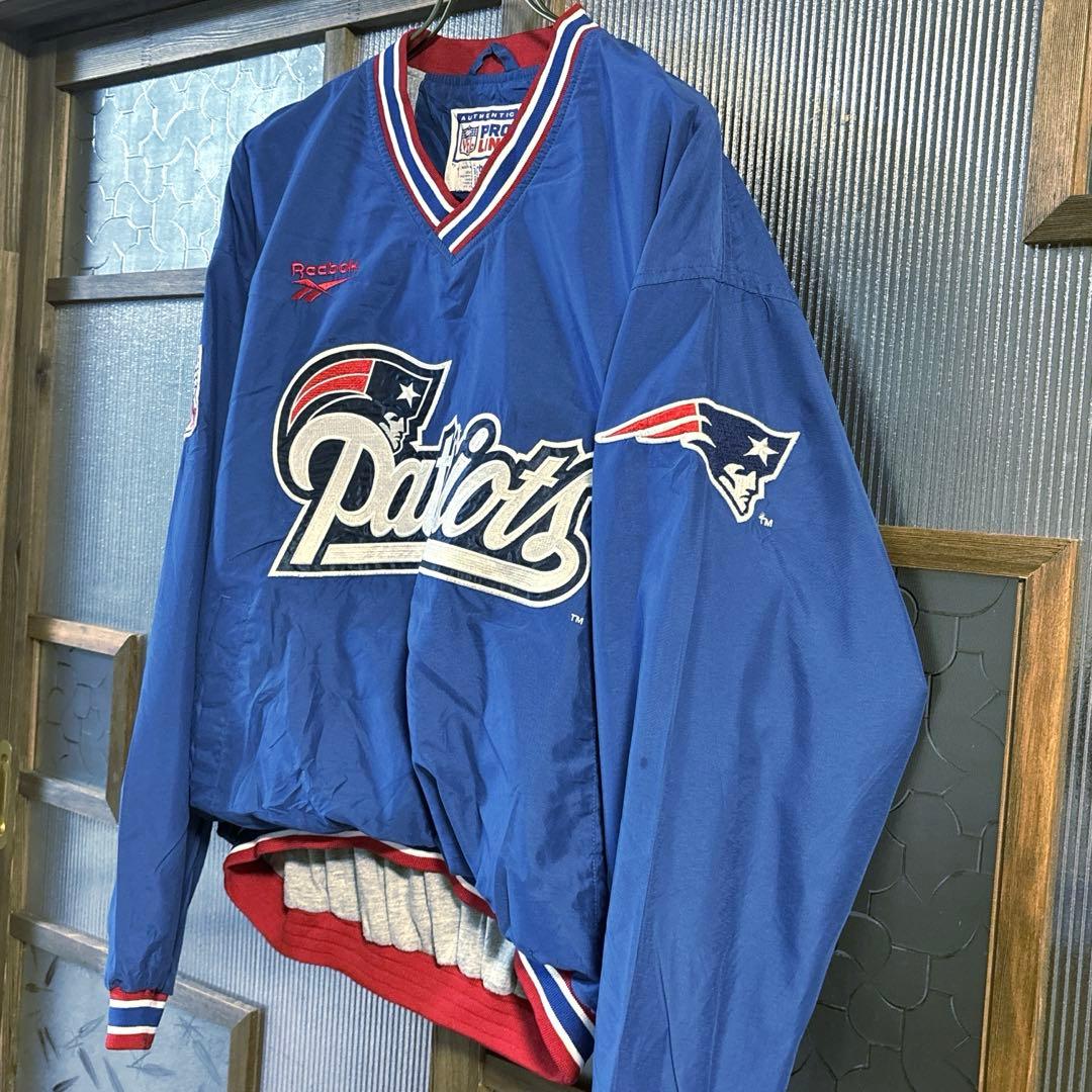90s US古着　Reebok NFL ナイロンプルオーバー　M 青バック刺繍
