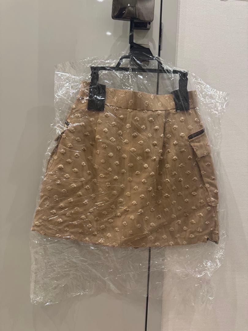 shéller ベージュミニスカート ポケット付き