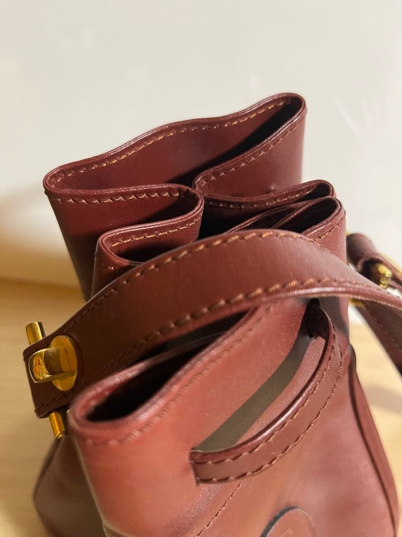 【未使用品 】カルティエ マストライン 巾着ショルダーバッグ レザー ボルドー