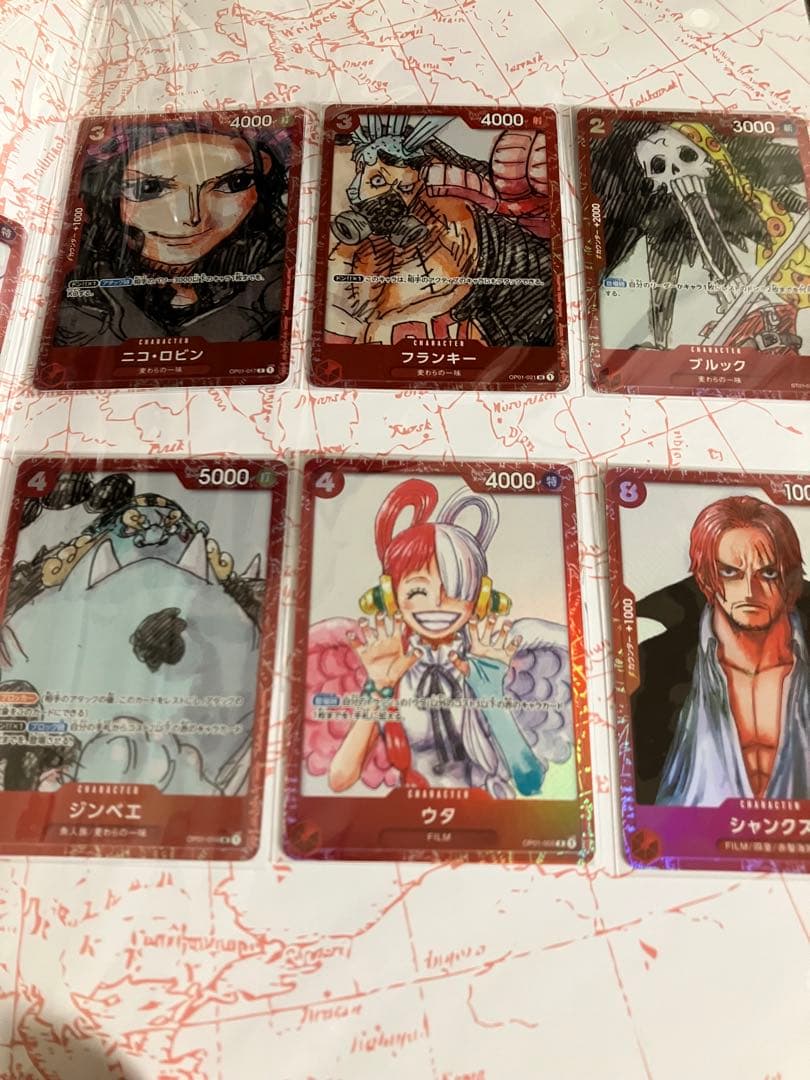 ワンピースカード　プレミアムコレクション等7冊未開封プロモ付25周年REDリーダ