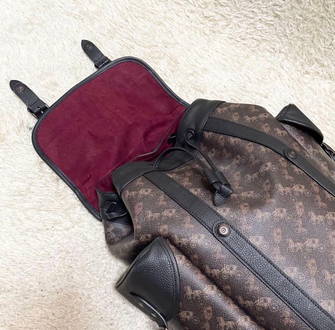 【美品/A4可】COACH 巾着　リュック　レザー　PVC　黒　馬車柄　ロゴ金具