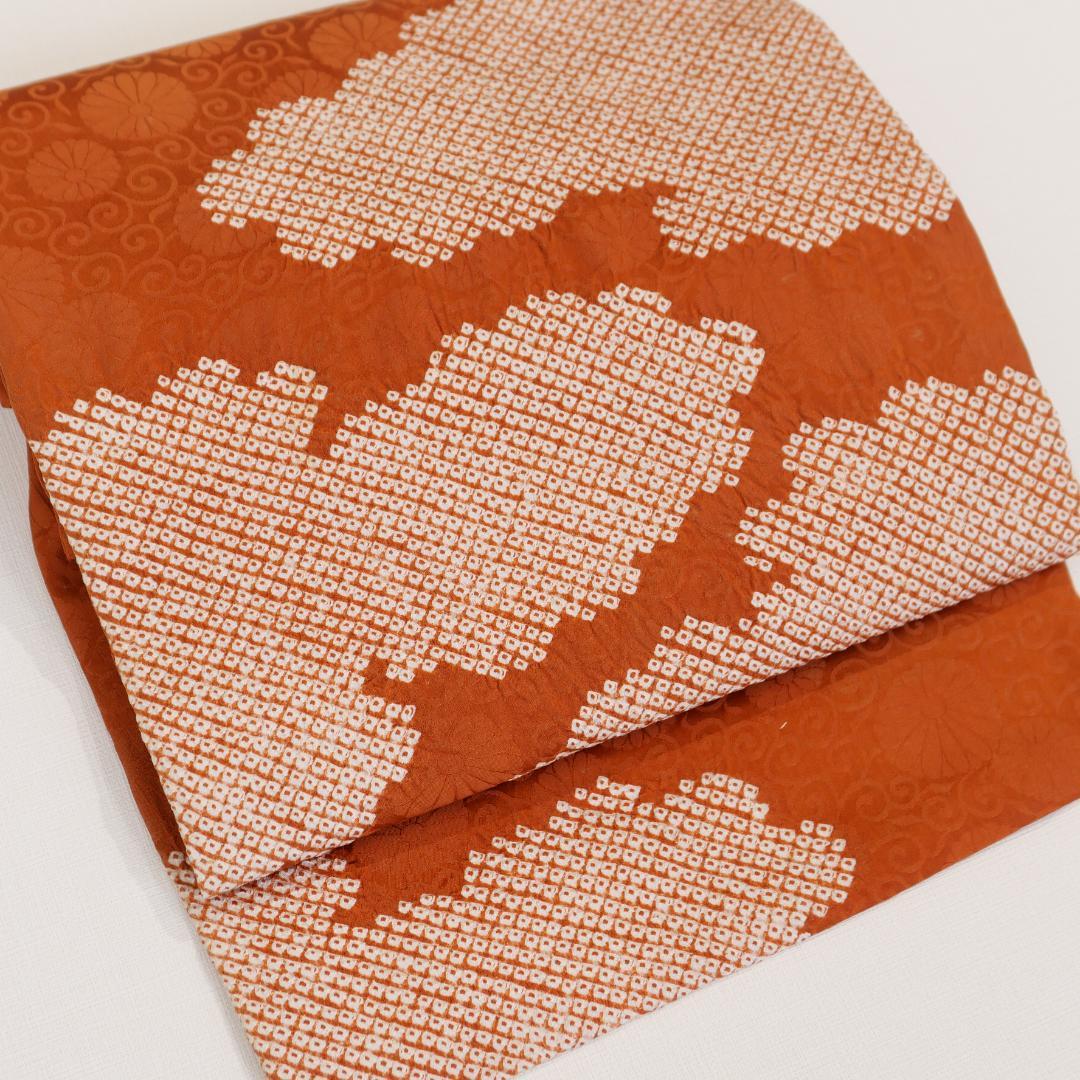 あ*い様 綸子縮緬 茶レンガ地 雲取り絞り 名古屋帯 正絹