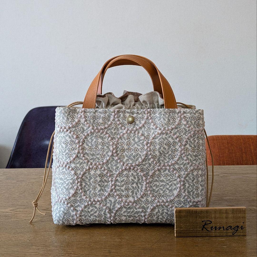 【1548】あおりポケットの巾着バッグ＊ミナペルホネン